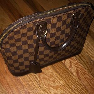 Louis Vuitton purse 100 percent aurthentic